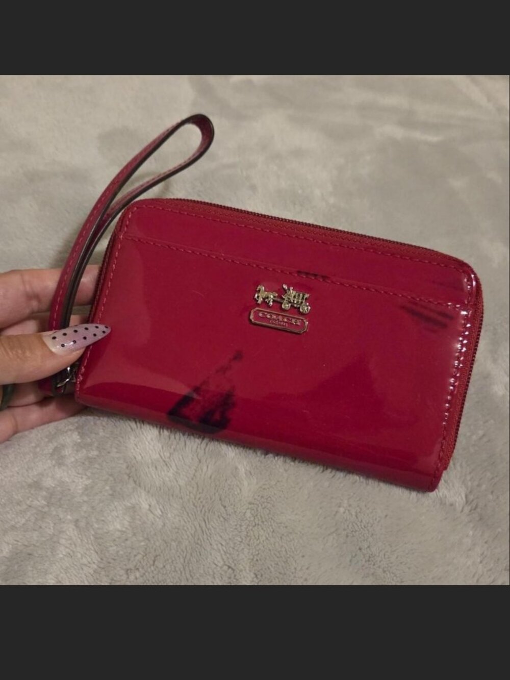 Coach Patent Leather Wristlet in a raspberry color